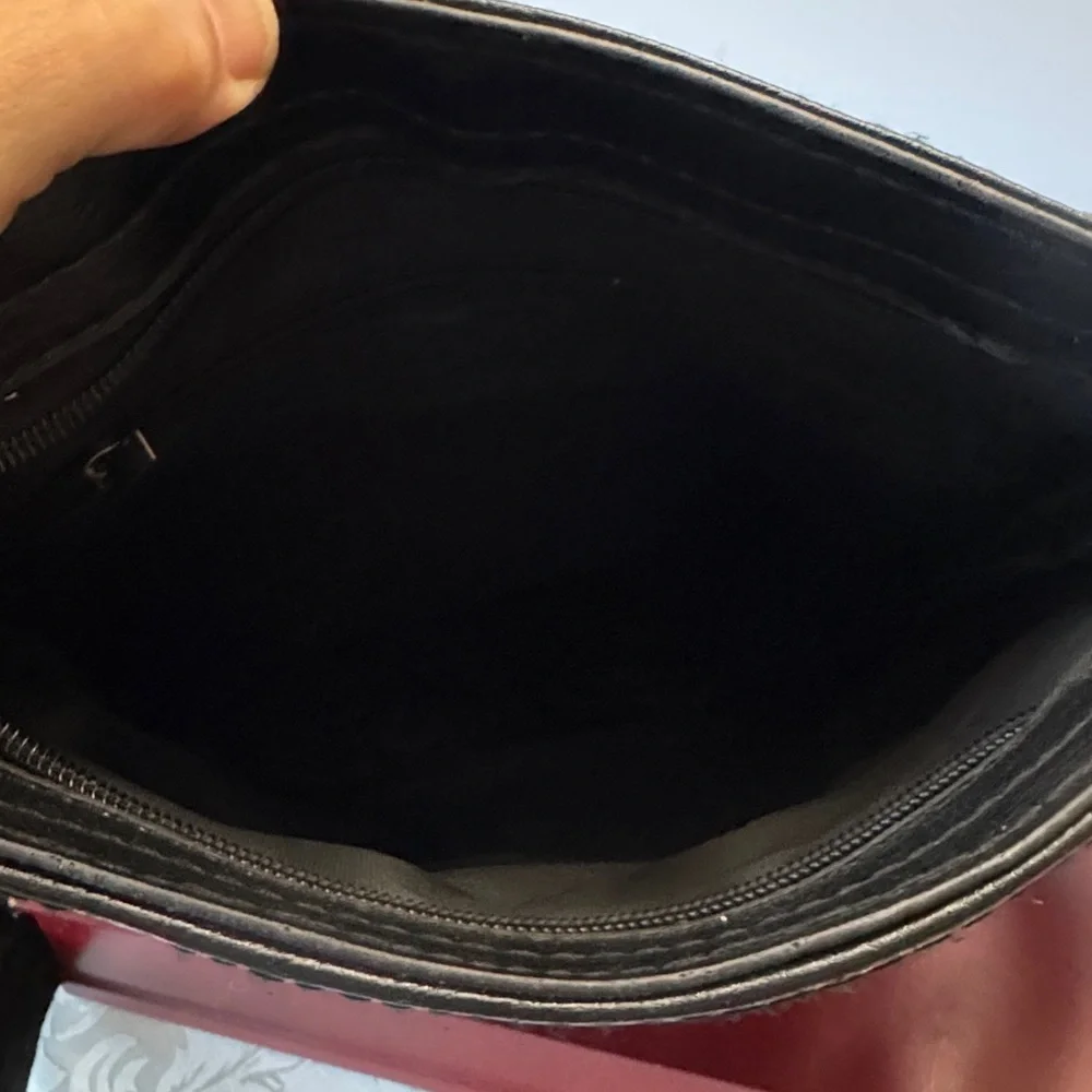 Delika-stylish black Crossbody messenger /handbag great for both men or women